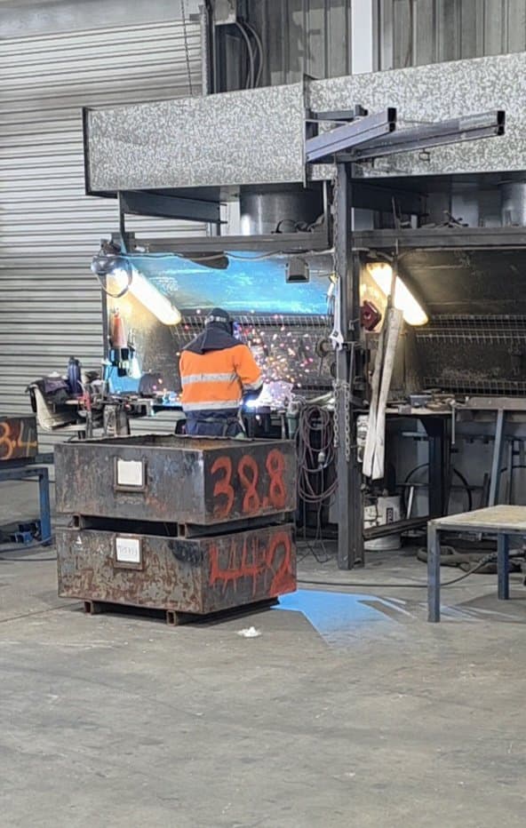 Fabrication bay welder at station